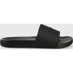 Calvin Klein klapki Pool Slide damskie kolor czarny. Czarne klapki Calvin Klein, bez wzorów, bez obcasa, na płaskiej podeszwie, bez zapięcia. Za 209.99 zł.