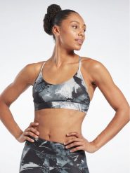 Reebok Biustonosz sportowy Lux Strappy Allover Print HS7793 Czarny. Czarne biustonosze sportowe Reebok, bez wzorów, z syntetyku. Za 109.99 zł.