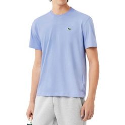 Lacoste Th7618 T-shirt. Fioletowe t-shirty Lacoste, s, bez wzorów, sportowe, bez kołnierzyka, bez ramiączek. Za 237.50 zł.