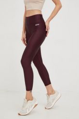 Dkny legginsy damskie kolor bordowy gładkie. Czerwone legginsy DKNY, bez wzorów, z dzianiny. W wyprzedaży za 209.99 zł.