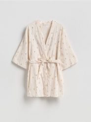 Szlafrok z lnem - kremowy. Białe szlafroki damskie Reserved, l, bez wzorów, z tkaniny, bez ramiączek. Za 149.99 zł.