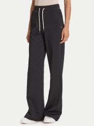 Guess Spodnie dresowe V5YB19 KBSL2 Czarny Regular Fit. Czarne spodnie sportowe Guess, z aplikacjami, z dresówki. Za 259.99 zł.