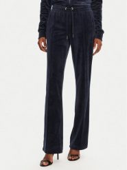 Juicy Couture Spodnie dresowe Tina JCAPW045 Granatowy Regular Fit. Niebieskie spodnie dresowe Juicy Couture, bez wzorów, z dresówki. Za 299.99 zł.