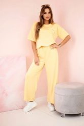 Komplet masełko bluzka z kwiatem + spodnie żółty. Żółte bluzki KESI, l, bez wzorów, z dresówki, eleganckie, bez kołnierzyka, plus size, bez ramiączek. Za 342.93 zł.