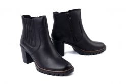 RIEKER Y2577-00 black, botki damskie. Czarne botki Rieker, bez wzorów, bez obcasa, na obcasie, bez zapięcia. Za 272.94 zł.