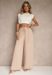 Jasnoróżowe Szerokie Spodnie High Waist z Gumką w Talii Ilnena. Czerwone jeansy Renee, na lato, bez wzorów, z jeansu, biznesowe, z podwyższonym stanem. W wyprzedaży za 63.99 zł.