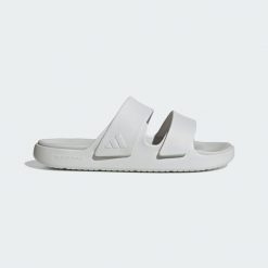 Sandały ZNSORY. Białe sandały adidas, bez wzorów, z materiału, klasyczne, bez obcasa, bez zapięcia. Za 220.00 zł.