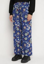 Niebieskie Spodnie z Bawełny z w Stylu Boho z Szerokimi Nogawkami i Gumką w Talii Jelvia. Niebieskie jeansy Born2be, bez wzorów, z bawełny, boho. Za 59.99 zł.