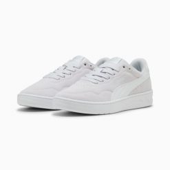 Buty sportowe damskie Puma COURT LALLY SD 40073405. Białe buty treningowe Puma, bez wzorów, z gumy, bez zapięcia. Za 178.56 zł.