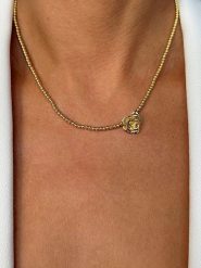 Les Favorites Pozłacany naszyjnik z elementem ozdobnym - dł. 40 cm rozmiar: onesize. Żółte naszyjniki Les Favorites, z materiału, pozłacane. Za 304.99 zł.