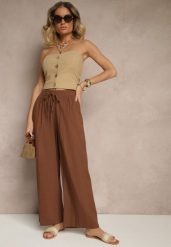 Brązowe Spodnie High Waist Szerokie z Bawełny Wiązane w Pasie z Gumką w Talii Yaslio. Brązowe jeansy Renee, bez wzorów, z bawełny, eleganckie, z podwyższonym stanem. W wyprzedaży za 39.99 zł.