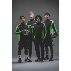 Wielokolorowy top treningowy Erima Celebrate 125 dla juniorów. Czarne topy Erima, bez wzorów, bez kołnierzyka, bez ramiączek. Za 180.50 zł.