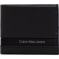 Calvin Klein Jeans portfel skórzany damski kolor czarny. Czarne portfele Calvin Klein Jeans, bez wzorów, z jeansu. Za 269.99 zł.
