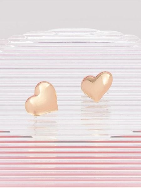 Kolczyki - złoty. Żółte kolczyki Sinsay, złote. Za 7.99 zł.