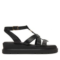 Sandały Tamaris. Czarne sandały Tamaris, bez wzorów, bez obcasa, na płaskiej podeszwie, bez zapięcia. Za 369.99 zł.