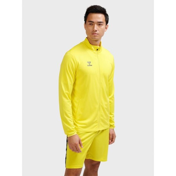 Kurtka z dresu Hummel Essential. Żółte kurtki Hummel, bez wzorów, z dresówki, sportowe, bez kaptura. Za 171.50 zł.