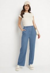 Niebieskie Szerokie Spodnie z Wiskozą Bawełną Wysokim Stanem Imitujące Jeans Caldexis. Niebieskie jeansy Born2be, l, bez wzorów, z bawełny, z podwyższonym stanem. Za 69.99 zł.