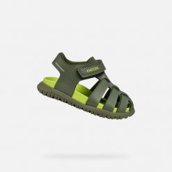 Sandały Geox Model B Sandal Fusbetto Bo Kolor Zielony. Zielone sandały Geox, bez wzorów, z tkaniny, bez obcasa, bez zapięcia. Za 193.50 zł.