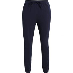 Adidas Originals SLIM CUF Spodnie treningowe legink. Spodnie dresowe marki adidas Originals. W wyprzedaży za 199.20 zł.