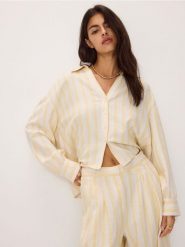 Koszula z wiskozą - jasnożółty. Żółte koszule Reserved, l, bez wzorów, z bawełny, bez kołnierzyka, bez ramiączek. W wyprzedaży za 39.99 zł.