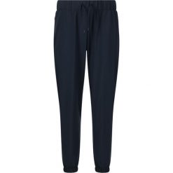 Damskie spodnie dresowe Athlecia Austberg. Niebieskie spodnie sportowe Endurance, bez wzorów, z dresówki, na fitness i siłownię. Za 251.50 zł.