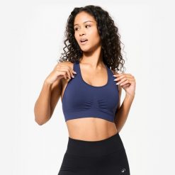 Stanik sportowy Kimjaly. Białe biustonosze sportowe KIMJALY, bez wzorów, z materiału, na jogę i pilates. Za 79.99 zł.