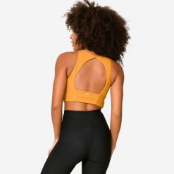 Stanik sportowy Decathlon crop top. Brązowe topy sportowe Decathlon, m, bez wzorów, na jogę i pilates. W wyprzedaży za 59.99 zł.
