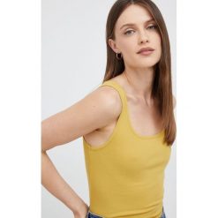 GAP top damski kolor żółty. Żółte topy GAP, l, bez wzorów, z materiału, bez kołnierzyka, bez ramiączek. Za 49.99 zł.