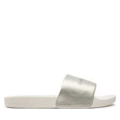 Klapki Calvin Klein Jeans. Niebieskie klapki Calvin Klein Jeans, bez wzorów, z jeansu, bez obcasa, bez zapięcia. Za 219.99 zł.