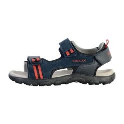 Sandały GEOX JR SANDAL STRADA A Niebieski. Niebieskie sandały Geox, bez wzorów, ze skóry, bez obcasa, bez zapięcia. Za 152.99 zł.