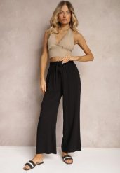Czarne Spodnie Palazzo High Waist z Bawełny Wykończone Gumką w Talii Nellsea. Czarne jeansy Renee, bez wzorów, z bawełny, eleganckie, z podwyższonym stanem. W wyprzedaży za 35.99 zł.