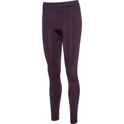 Damskie legginsy bezszwowe z wysokim stanem Hummel Shaping. Fioletowe legginsy Hummel, bez wzorów, z materiału, sportowe. Za 166.00 zł.
