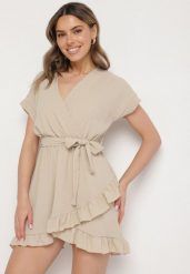 Beżowa Rozkloszowana Sukienka Ozdobiona Falbanami i Paskiem Zivene. Brązowe sukienki Born2be, na imprezę, l, bez wzorów, eleganckie, bez kołnierzyka, bez ramiączek, mini, rozkloszowane. W wyprzedaży za 55.24 zł.