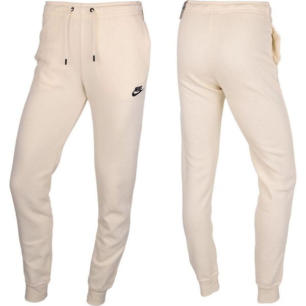 Spodnie Sportowe damskie Nike. Brązowe spodnie dresowe Nike, bez wzorów, długie. Za 298.86 zł.