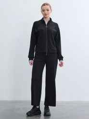 BGN Spodnie w kolorze czarnym rozmiar: 38. Czarne spodnie materiałowe BGN, bez wzorów, z materiału. Za 108.99 zł.