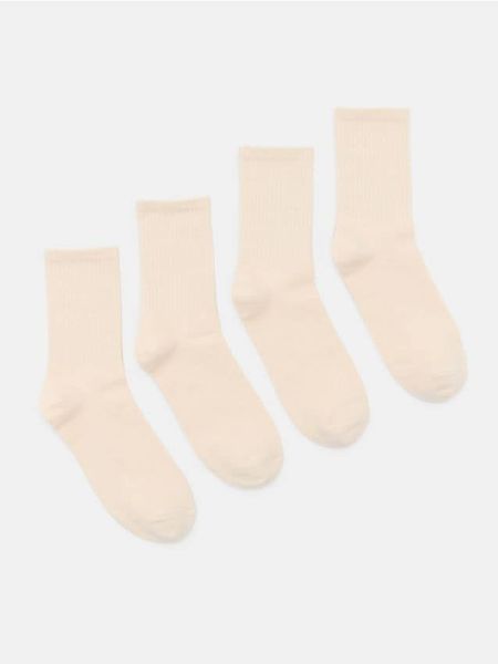 Prążkowane skarpetki 4 pack - kremowy. Białe skarpetki Sinsay, bez wzorów, prążkowane. Za 12.99 zł.