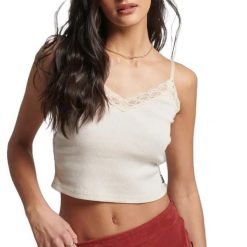 Prążkowany tank top z koronkowym wykończeniem Superdry. Białe topy Superdry, bez wzorów, z koronki, eleganckie, bez kołnierzyka, bez ramiączek. Za 75.80 zł.