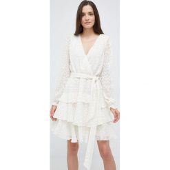 Lauren Ralph Lauren sukienka 250872549002 kolor beżowy mini rozkloszowana. Brązowe sukienki Lauren Ralph Lauren, bez wzorów, z materiału, bez kołnierzyka, bez ramiączek, mini, rozkloszowane. W wyprzedaży za 999.90 zł.