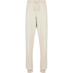 Spodnie dresowe dla kobiet Urban Classics Light Terry. Białe spodnie sportowe Urban Classics, bez wzorów, z dresówki, długie. Za 191.00 zł.