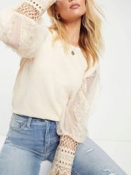 Milan Kiss Bluzka w kolorze kremowym rozmiar: M. Brązowe bluzki Milan Kiss, m, bez wzorów, z koronki, bez kołnierzyka, bez ramiączek. Za 130.99 zł.