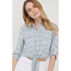 Guess koszula damska regular z kołnierzykiem klasycznym. Niebieskie koszule Guess, l, z aplikacjami, z lyocellu, klasyczne, bez kołnierzyka, bez ramiączek. Za 459.99 zł.