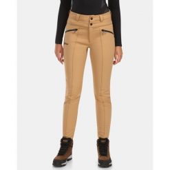 Spodnie softshell damskie Kilpi MAURA-W. Brązowe spodnie narciarskie Kilpi, bez wzorów, z softshellu, narciarskie. Za 680.25 zł.