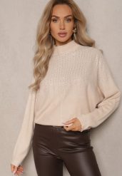 Beżowy Golf o Kroju Oversize z Eleganckim Cyrkoniowym Zdobieniem przy Dekolcie Melirra. Brązowe swetry Renee, na zimę, z aplikacjami, eleganckie, bez ramiączek. W wyprzedaży za 79.99 zł.