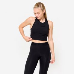 Koszulka fitness damska Domyos crop top bez rękawów. Czarne topy sportowe DOMYOS, l, bez wzorów, z elastanu, na fitness i siłownię. Za 69.99 zł.