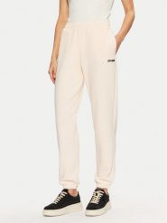 Guess Spodnie dresowe V5RB02 KCLD1 Écru Regular Fit. Spodnie dresowe Guess, z aplikacjami, z dresówki. Za 199.99 zł.
