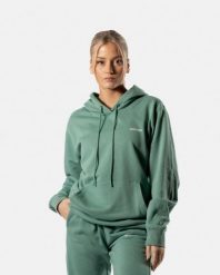 Damska bluza z kapturem 365 oversize z kieszenią kangurką – ciemnozielony. Zielone bluzy AESTHETIC WOLF, s, bez wzorów, z bawełny, klasyczne, bez ramiączek, z kapturem. Za 159.99 zł.