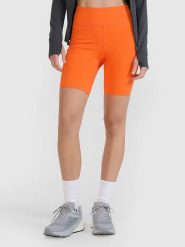 4F Szorty funkcyjne w kolorze pomarańczowym rozmiar: L. Pomarańczowe szorty sportowe 4f, bez wzorów, z materiału, na fitness i siłownię. Za 73.95 zł.