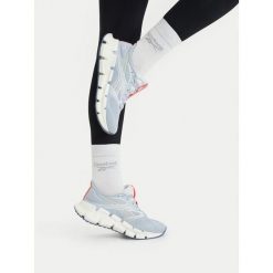 Buty do biegania Reebok. Niebieskie buty do biegania Reebok, bez wzorów, bez zapięcia, do biegania. Za 489.99 zł.