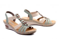 RIEKER V2451-52 green, sandały damskie. Zielone sandały Rieker, bez wzorów, bez obcasa, na koturnie, bez zapięcia. Za 299.90 zł.