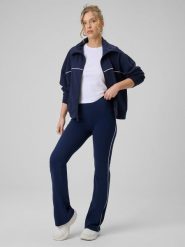 4F Legginsy z rozszerzanymi nogawkami damskie - granatowe XL. Niebieskie legginsy 4f, bez wzorów, z bawełny. Za 129.99 zł.